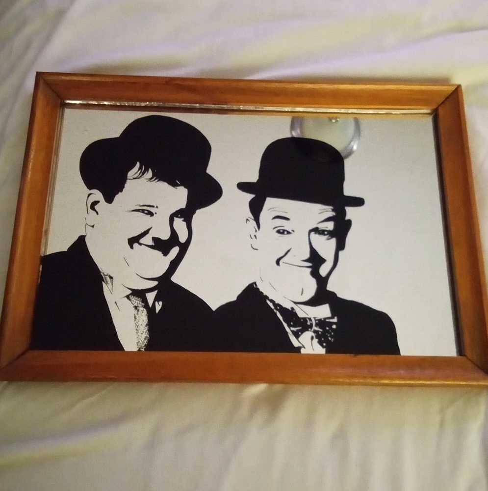 80 s LAUREL & HARDY FRAMED MIRROR 13 " X 91/2 INCHES WOOD FRAME. MADE IN ENGLAND